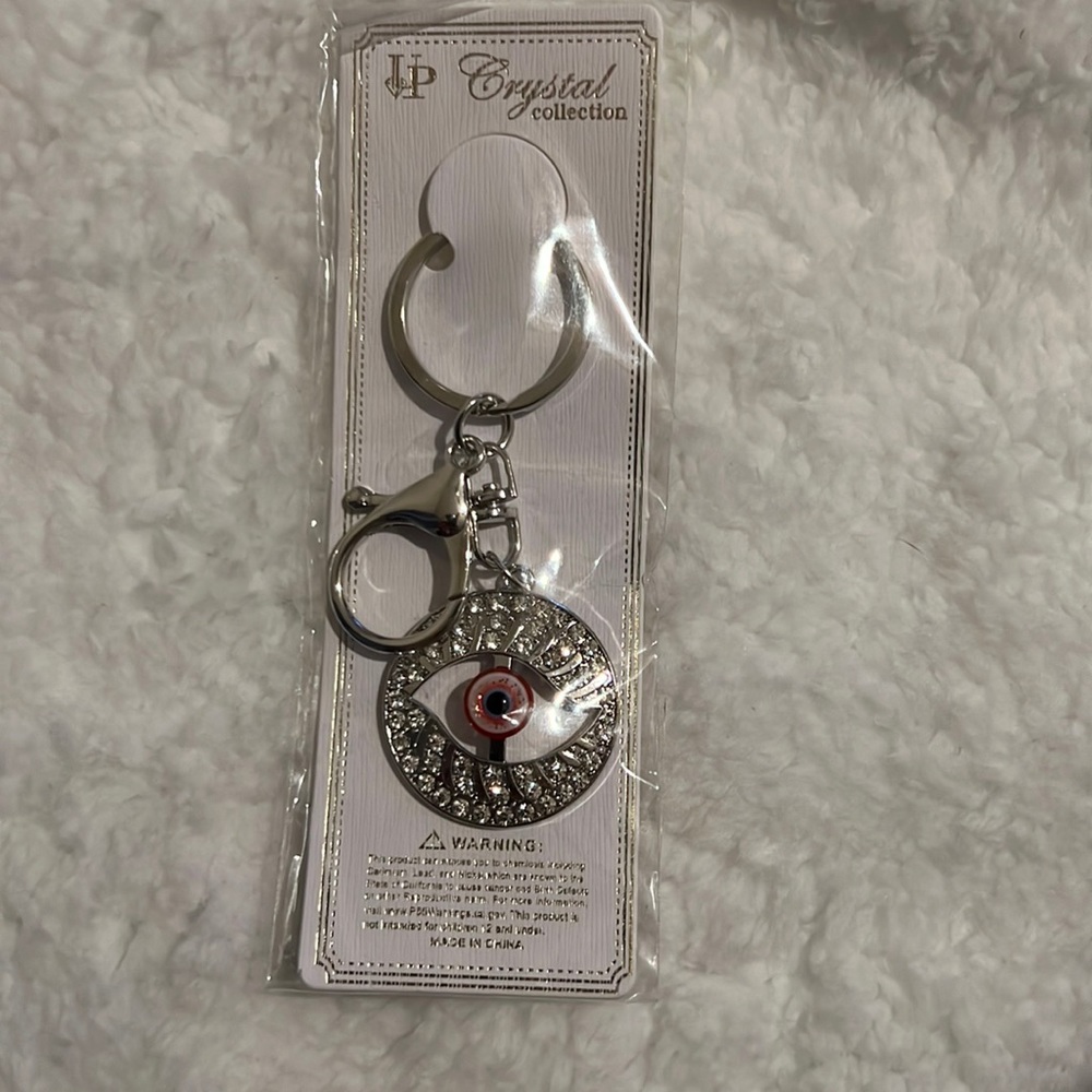 Evil eye silver keychain.